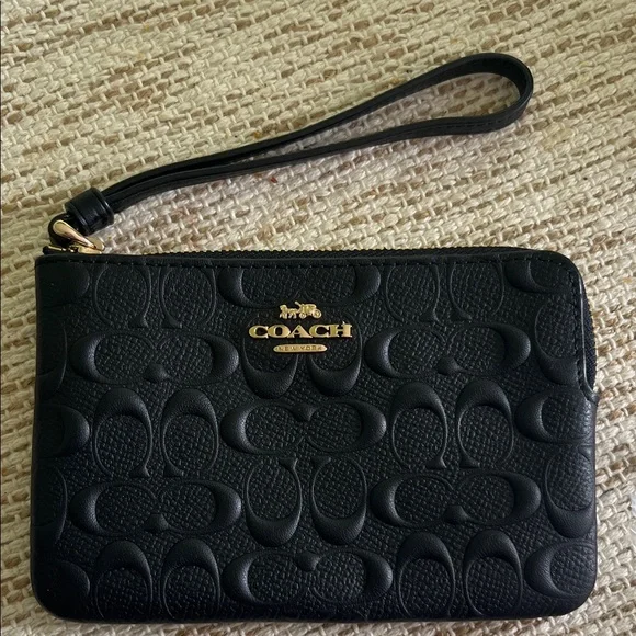 NWT Coach Black Embossed Logo Wristlet with Gold Hardware - Picture 1 of 3